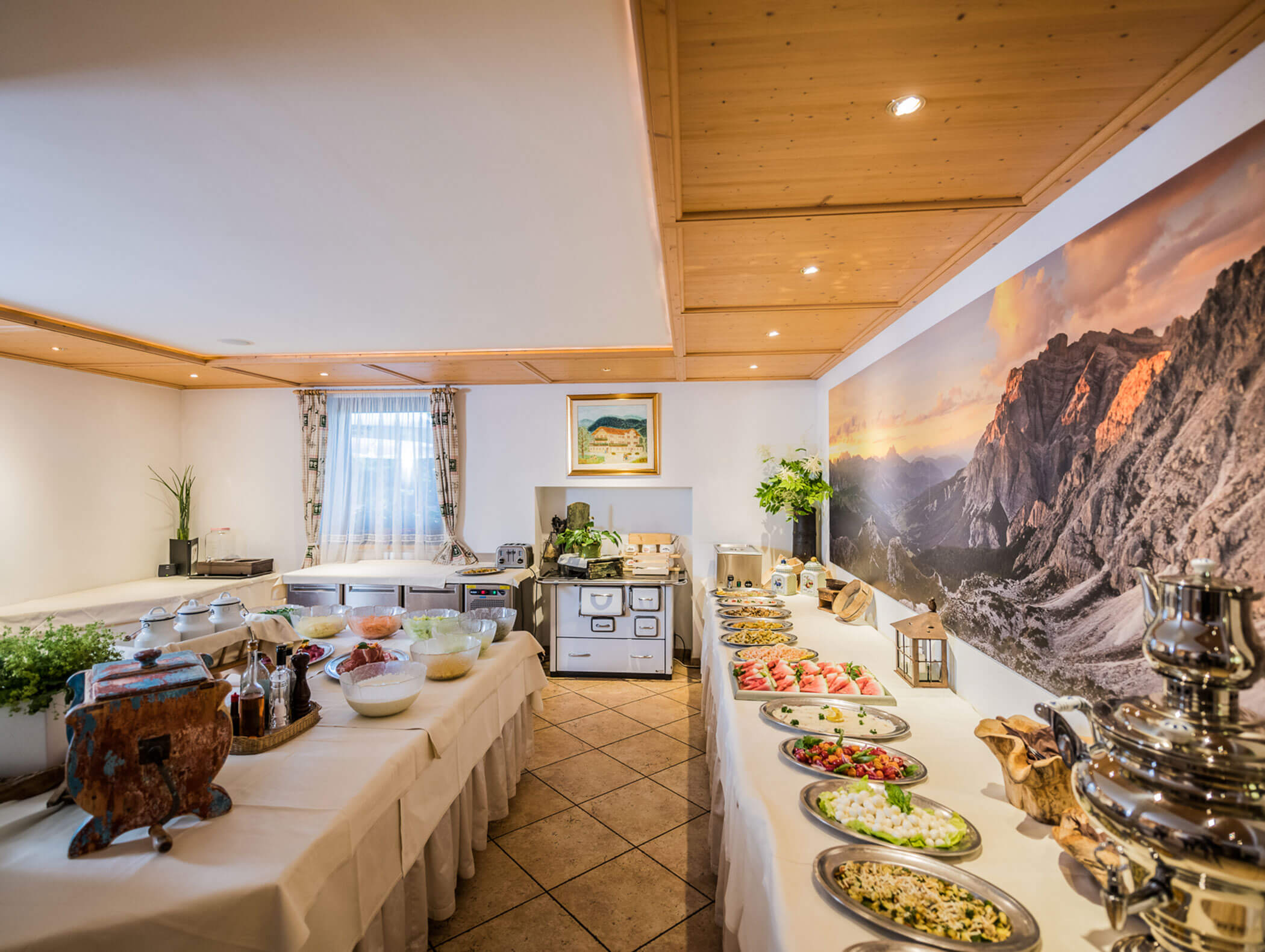 Full salad buffet with wood-fired oven in the background - Wirtshaushotel Alpenrose