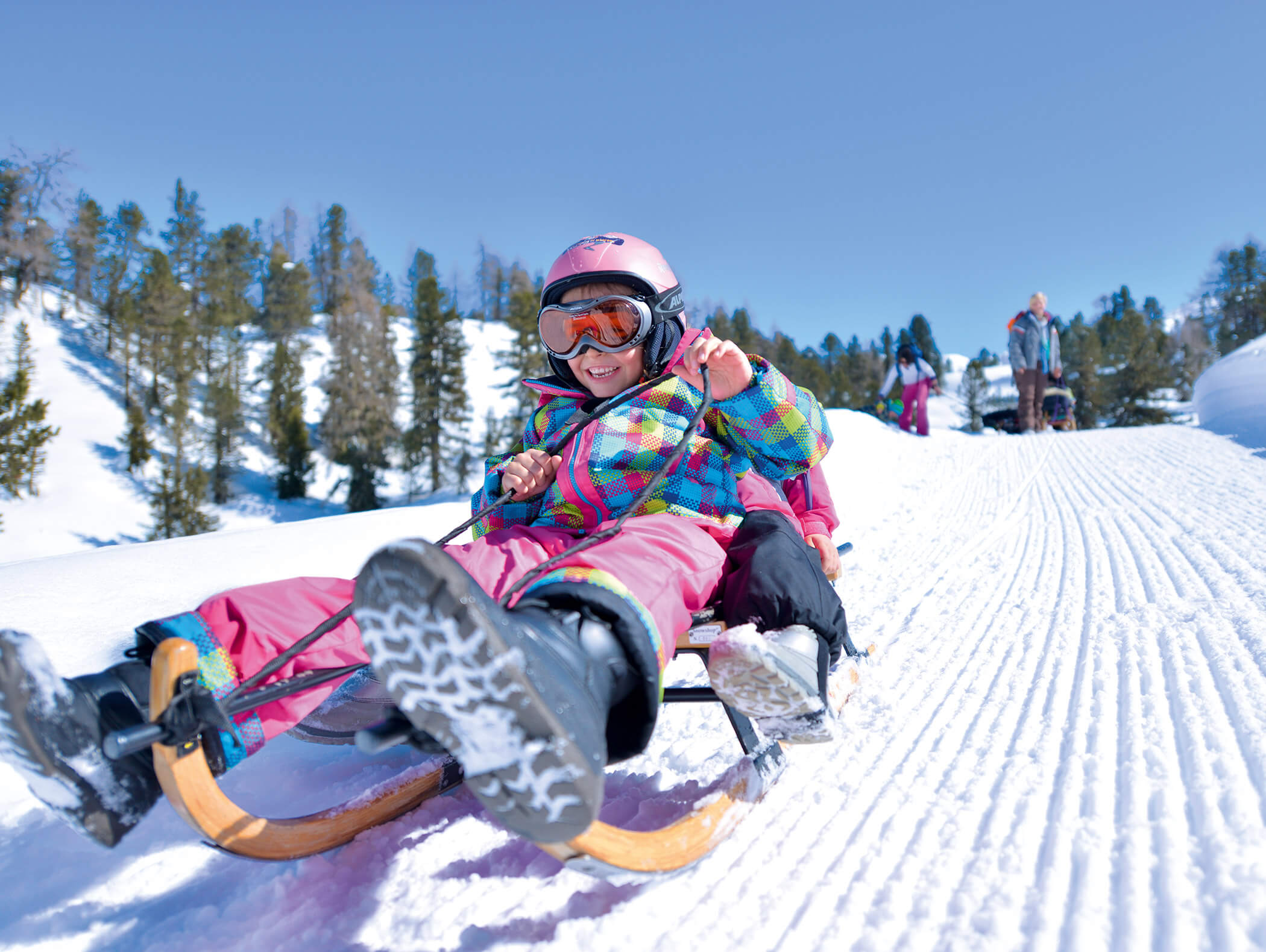 Children on a toboggan