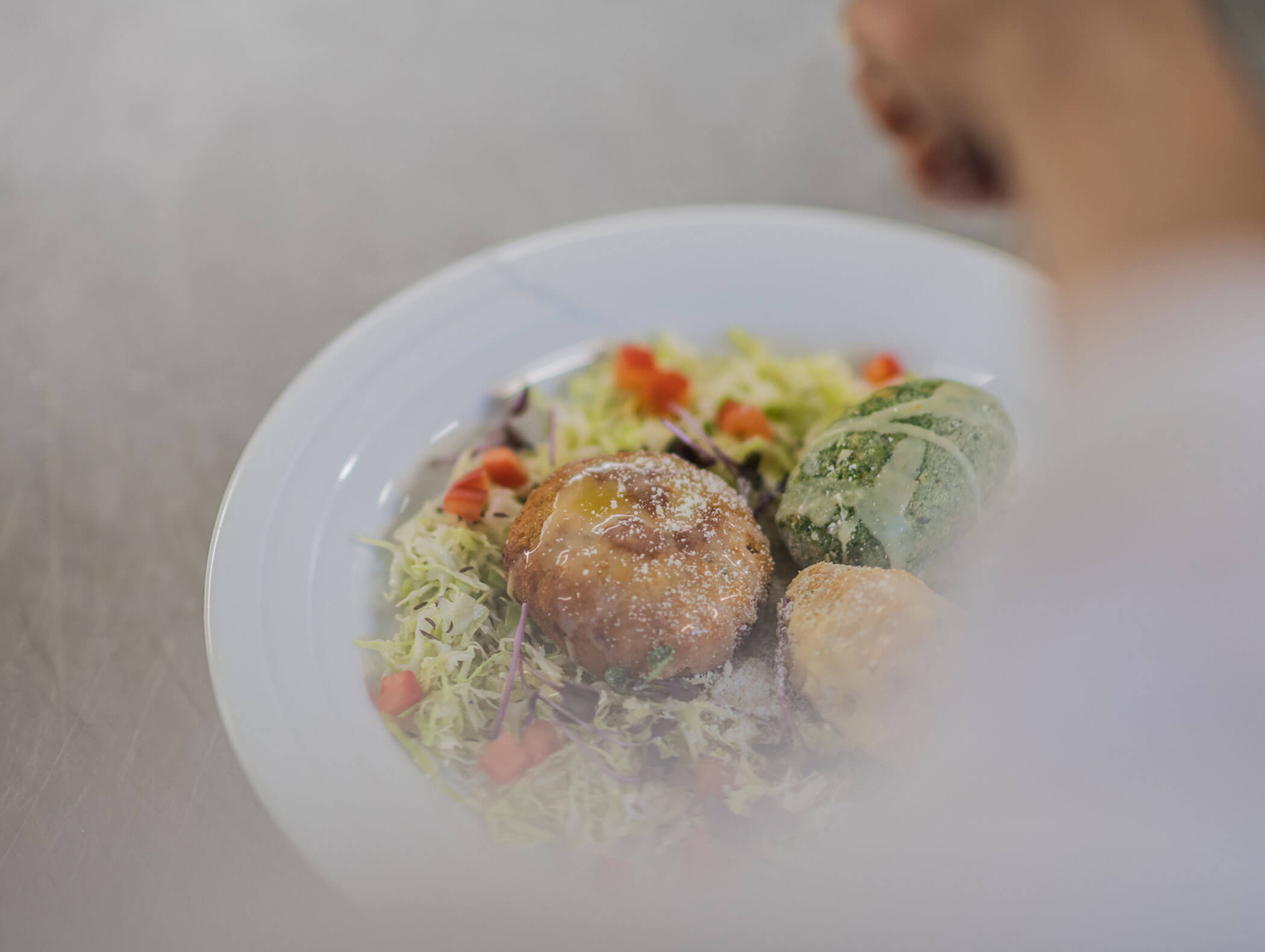 Knödeltris mit Krautsalat - Wirtshaushotel Alpenrose