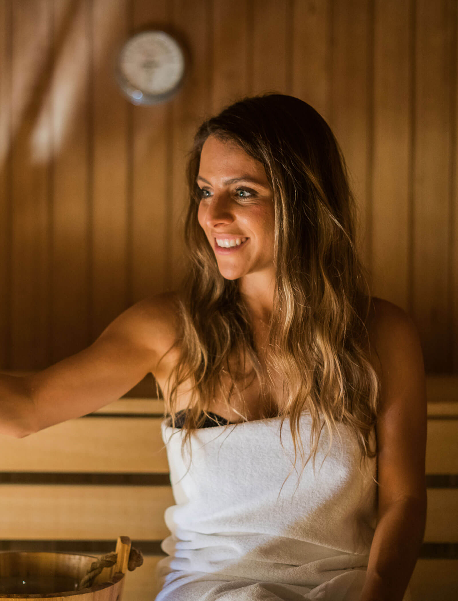 Woman in sauna - Wirtshaushotel Alpenrose